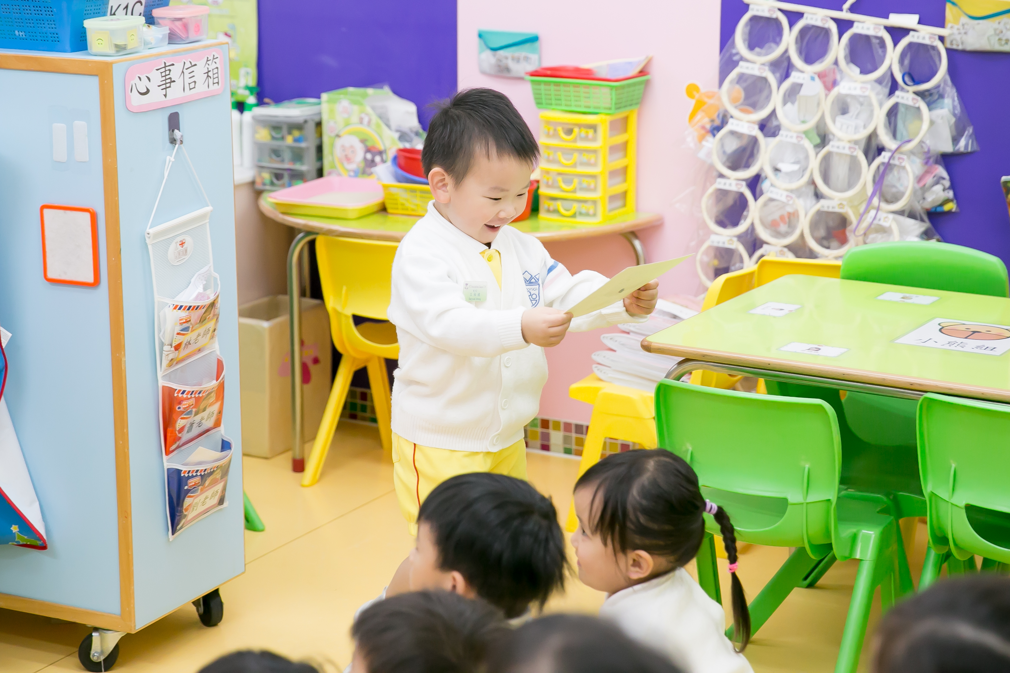 cute chinese boy is smiling in the TEFL classroom